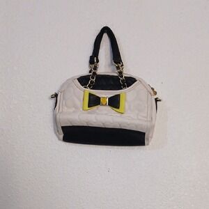 Elegant Cream and Black Handbag with Bow Accent